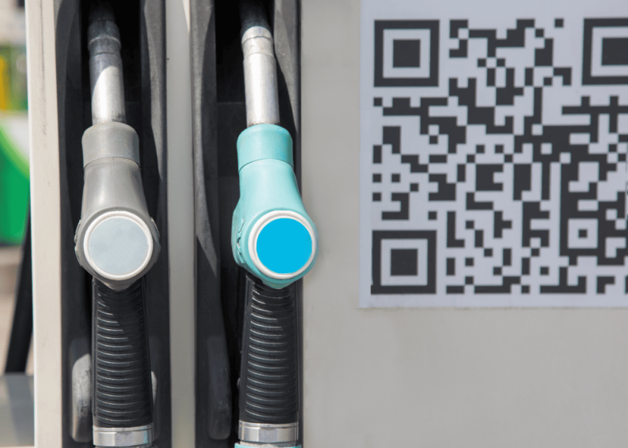 A QR Code on a fuel pump.