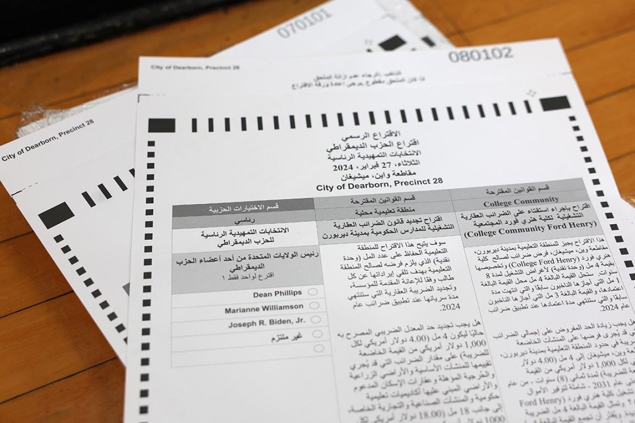 In this photo illustration, a primary ballot in Arabic is seen at Edsel Ford High School on February 27, 2024 in Dearborn, Michigan.