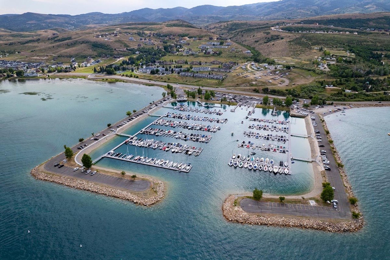 Aerial view of the Bear Lake Marina with many boats in the water in 2024.