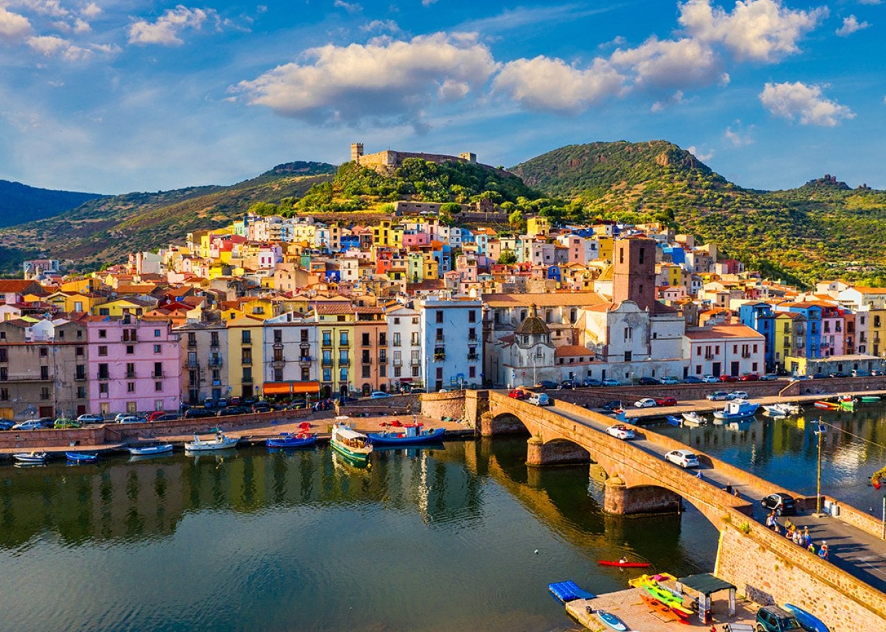 An aerial view of the Bosa Village's colorful houses in Sardinia, Italy.