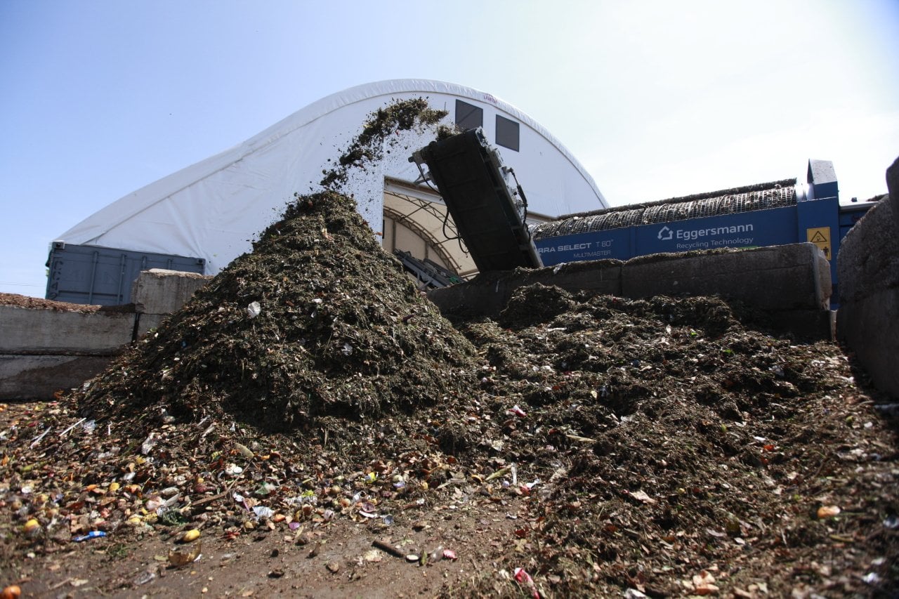 A machine sorts organic material (yard and food waste) at the Staten Island Compositing Facility in New York City. Despite a citywide requirement to compost food and yard waste, only 10% of the material is currently being diverted from landfills.