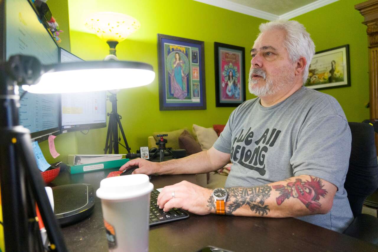 Greg Green, who has been out of work since March, looks at job postings on his computer in his home in South Jordan on Friday, January 23, 2026.