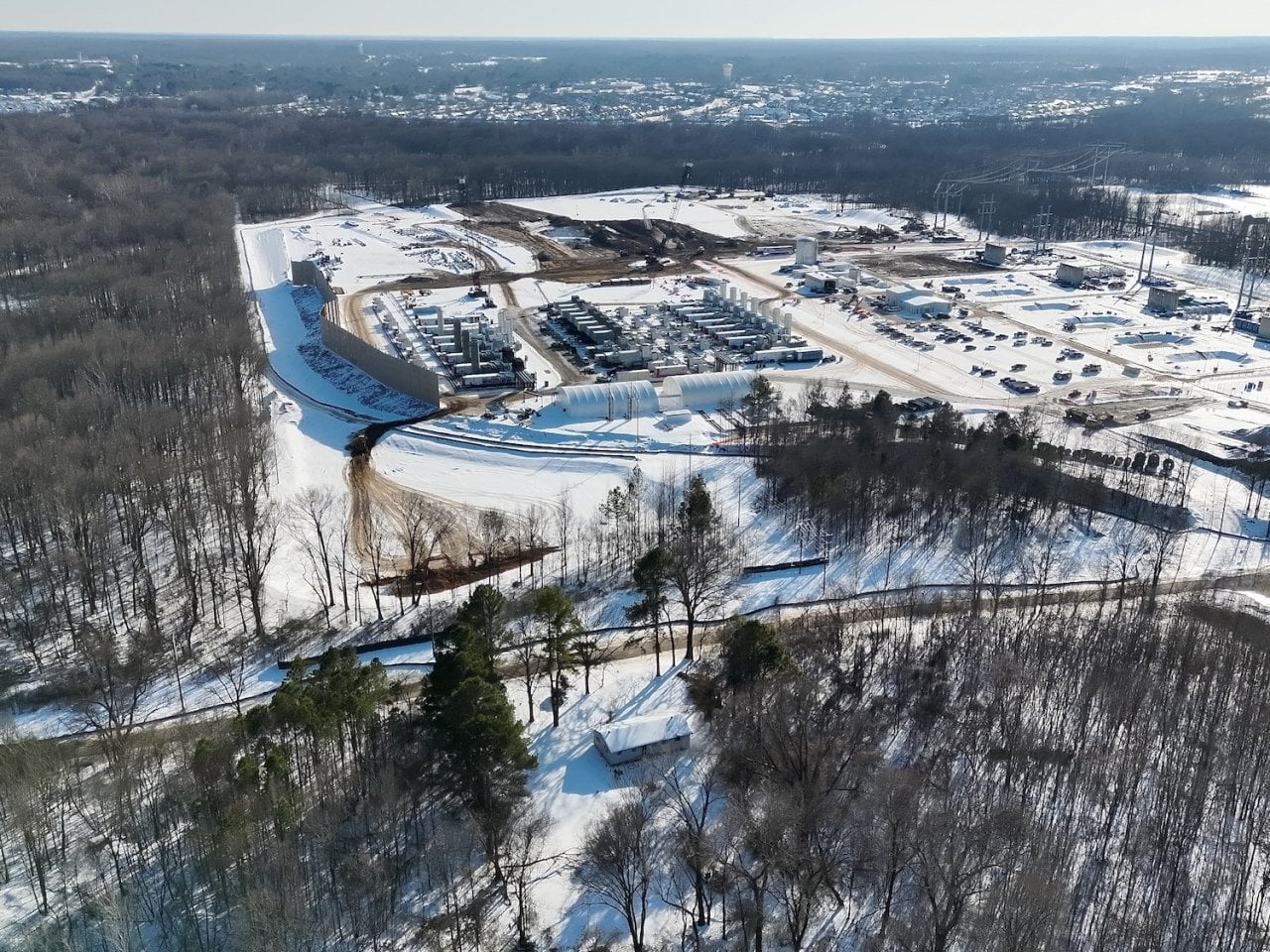 Krystal Polk’s family home (foreground) sits directly across the street from xAI’s gas plant in Southaven, Mississipi.