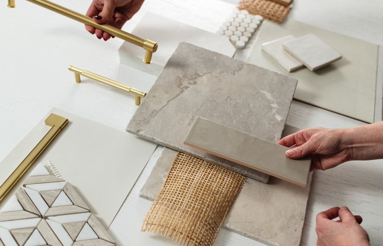 A flat lay photo of tiles and house fixtures. 