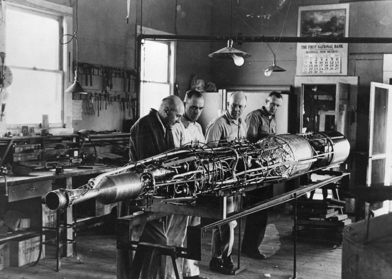 Rocket with turbopumps that inject propellants into the combustion chamber on its assembly frame is shown without its casing at the Goddard shop in Roswell, New Mexico