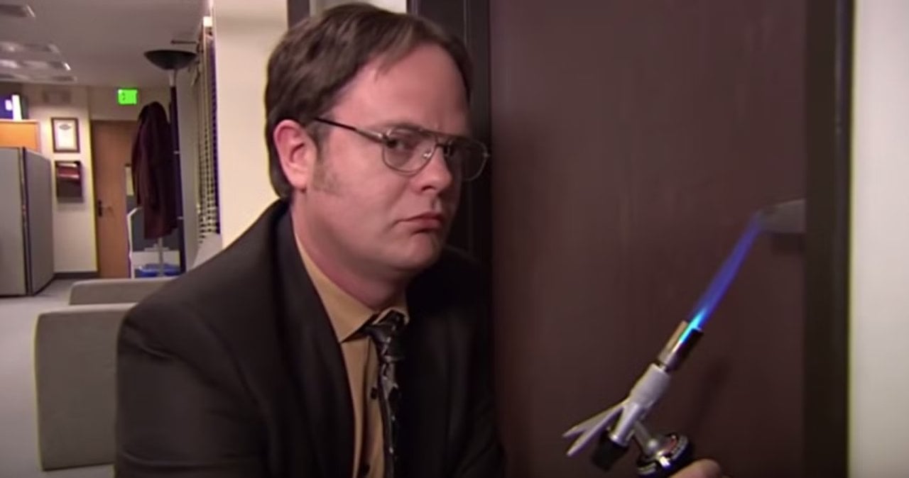 Dwight heating up a door handle on The Office