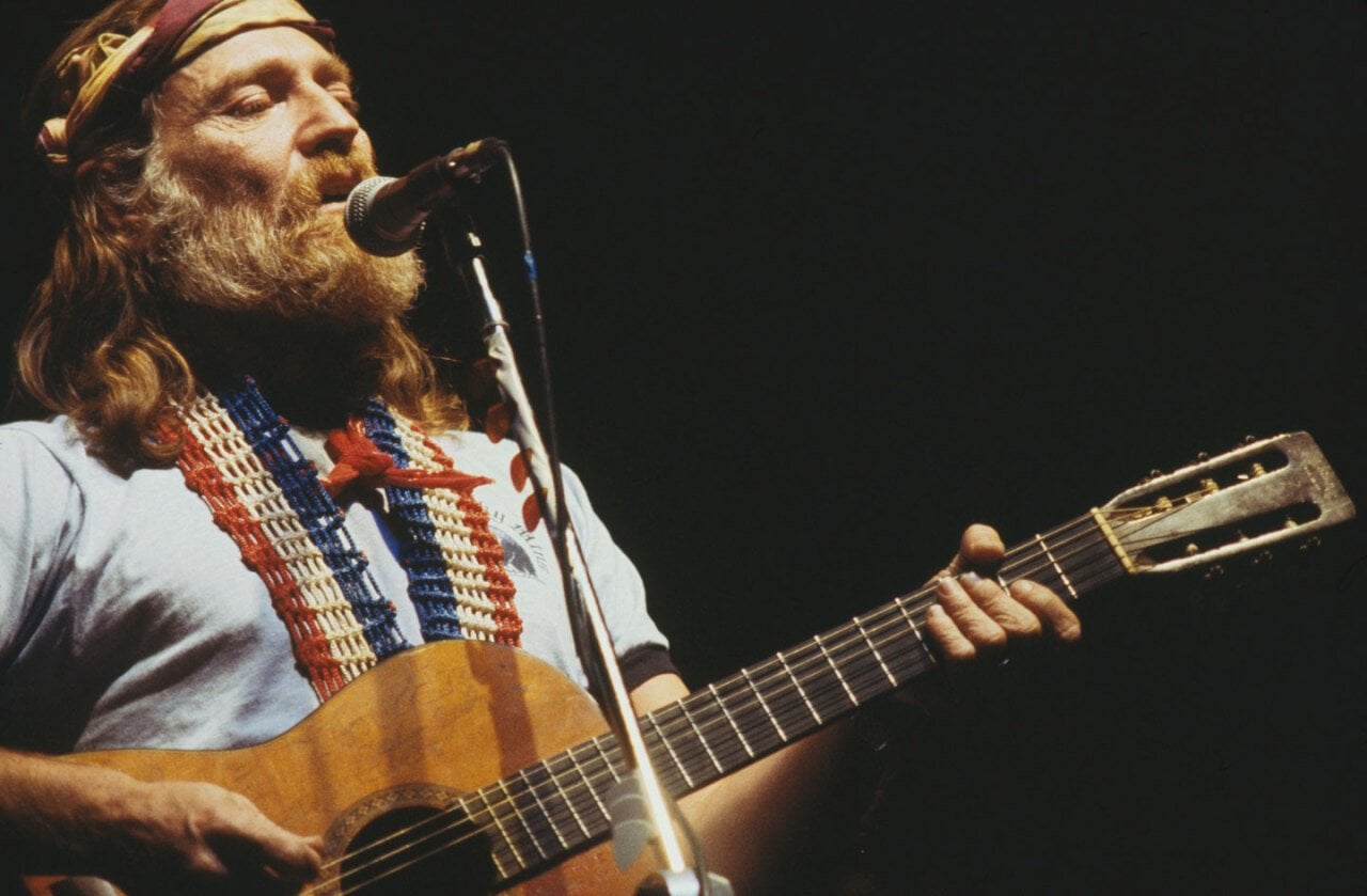 American singer, songwriter and musician, Willie Nelson performs live on stage in New York in April 1978. 