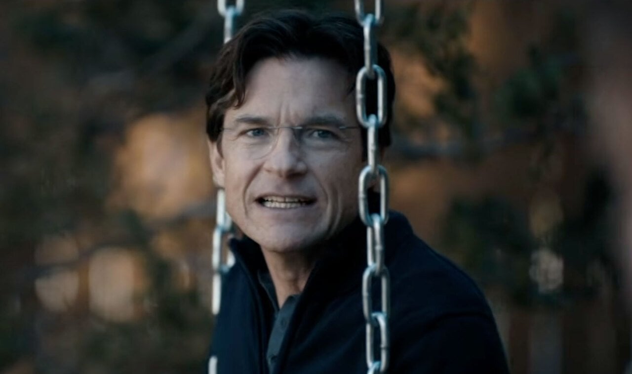 Jason Bateman sitting on a swing in DTF St. Louis