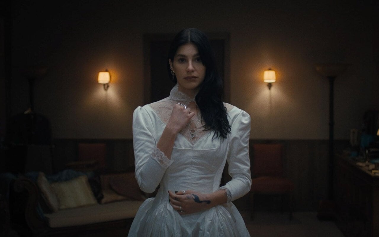 Camila Morrone wearing a wedding dress in Something Bad is Going to Happen