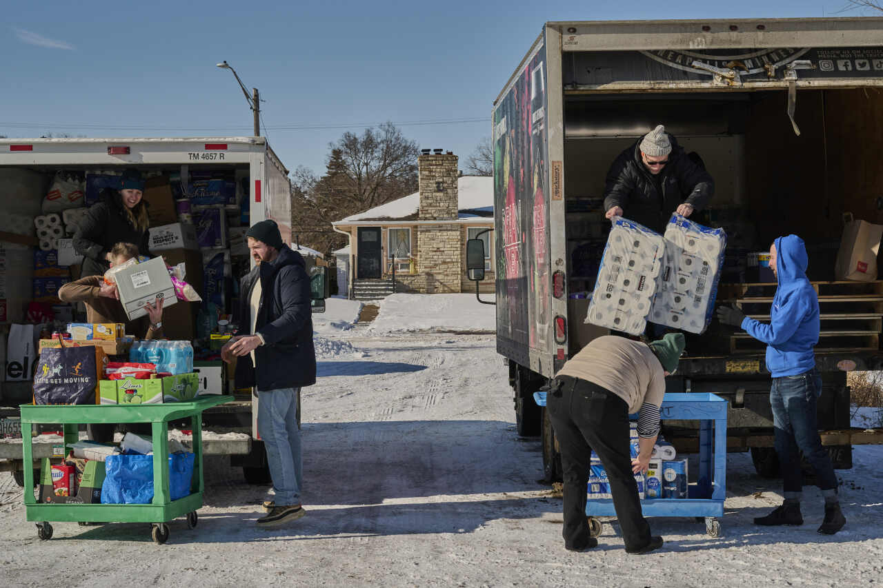 Volunteers with Community Aid Network MN. In the final week of January, the organization served roughly 575 families, nearly double its November numbers.