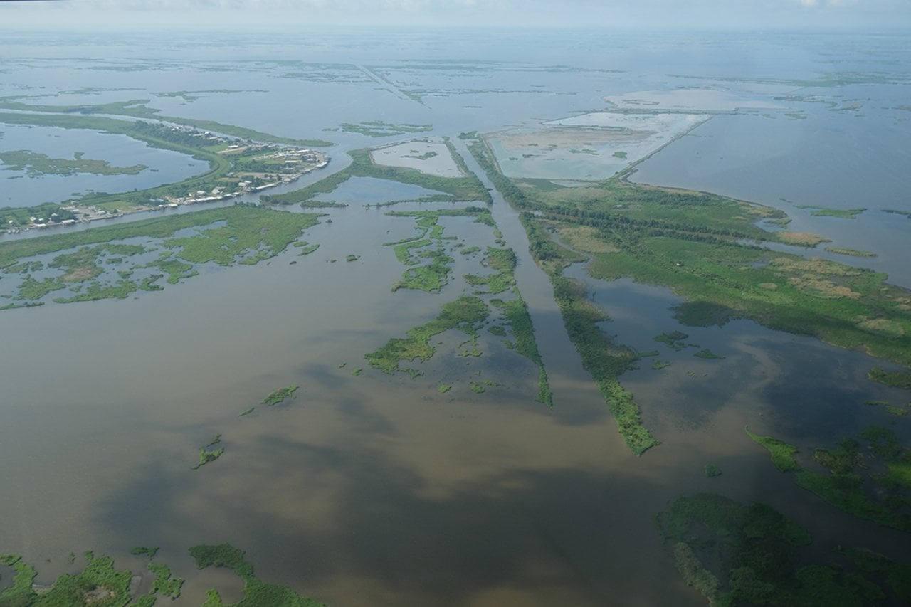 Former oil field in Plaquemines Parish on May 24, 2025 at a site named in one of the coastal damage cases, where the dredging of canals and dumping of toxic waste is alleged to have contributed to significant land loss around the community of Delacroix.