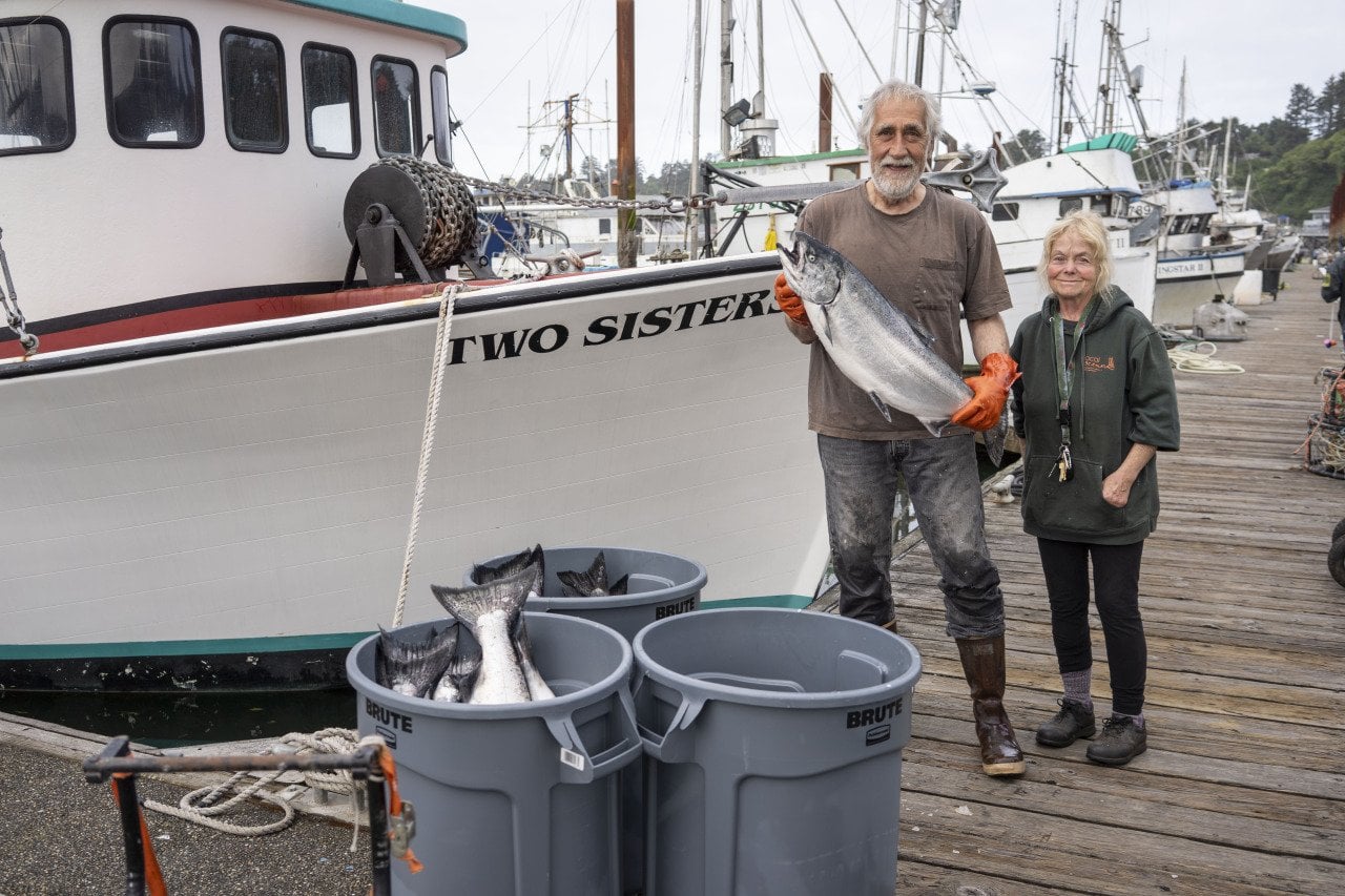 Newport fisherman Larry Davis and Local Ocean fishmonger Amber Morris. Local Ocean is buying Davis’ whole catch of Chinook salmon this season.