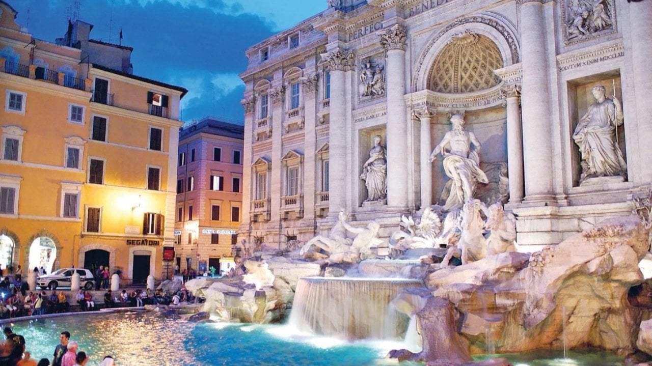 A night view of the Trevi Fountain in Rome.