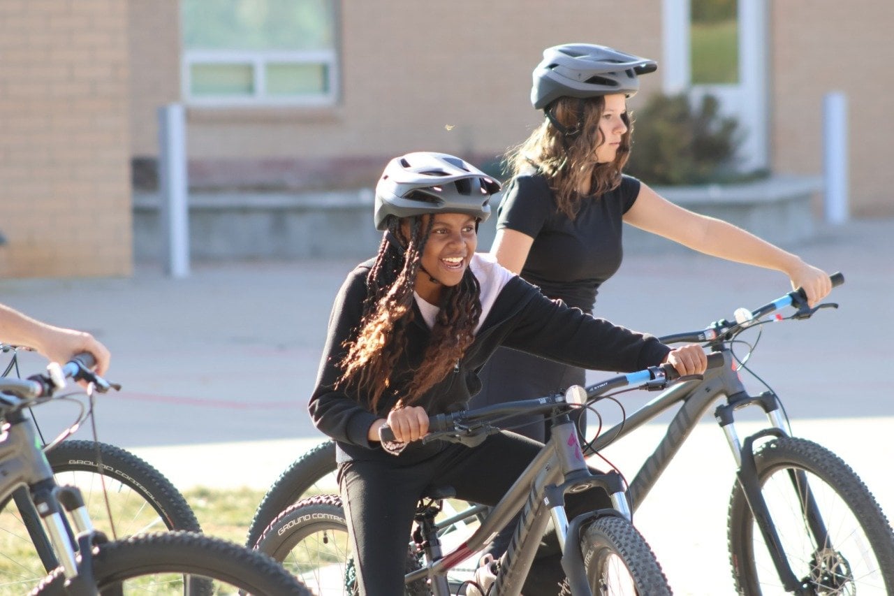 Two students on bikes from Silverton Public School in Silverton, Colorado.
