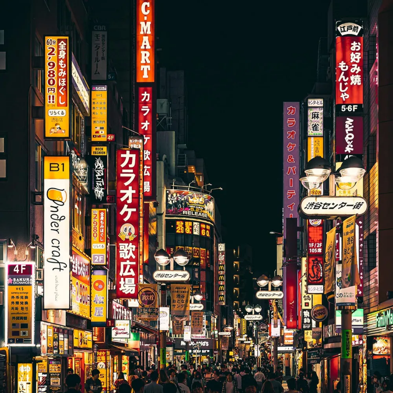 Bright and neon-light streets of commercial shops and stores in Tokyo, Japan.