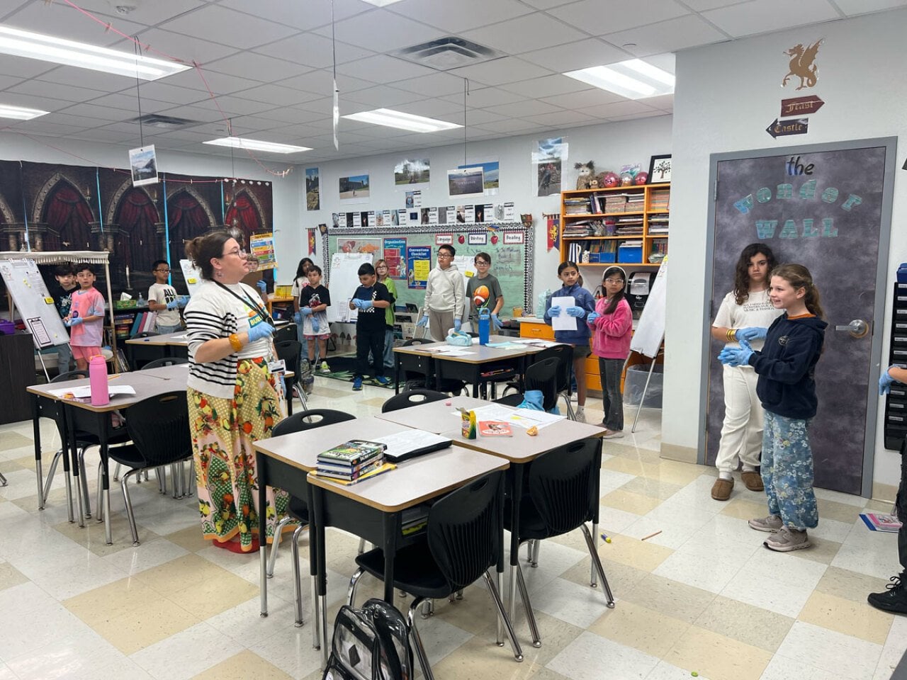 Hanna Patton-Elliott, a third grade teacher at Windsor Park Elementary, instructs her students to be doctors in a reading and writing exercise.