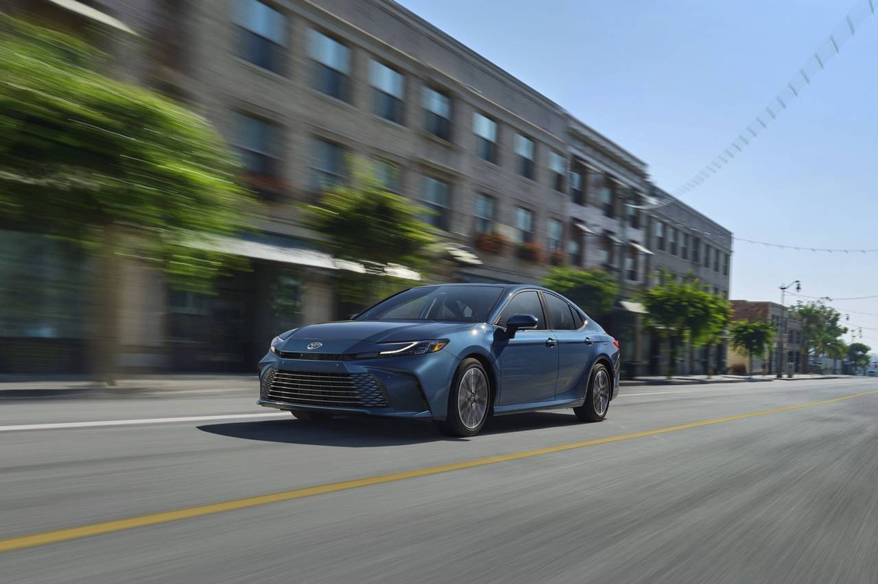 2026 Toyota Camry front three-quarter view on the road.