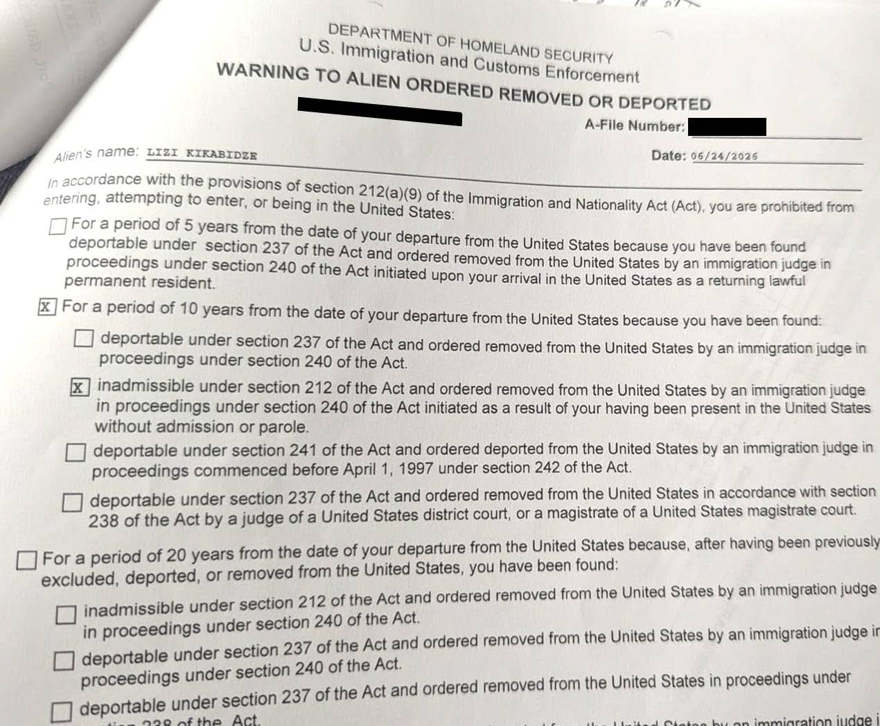 U.S. Immigration and Customs Enforcement issued documents to Kikabidze and her children banning them from returning to the United States for 10 years.