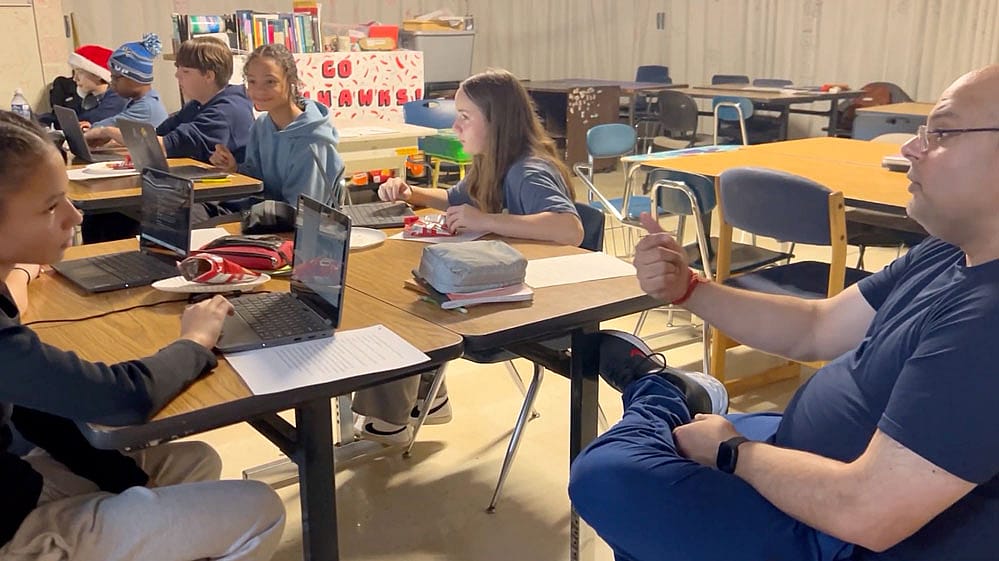 Illinois history teacher Ashley Kannan says he now builds homework writing assignments around one-on-one conferences that help ground the writing “in the hearts and minds of a student” rather than in a generic prompt that AI can complete on command.