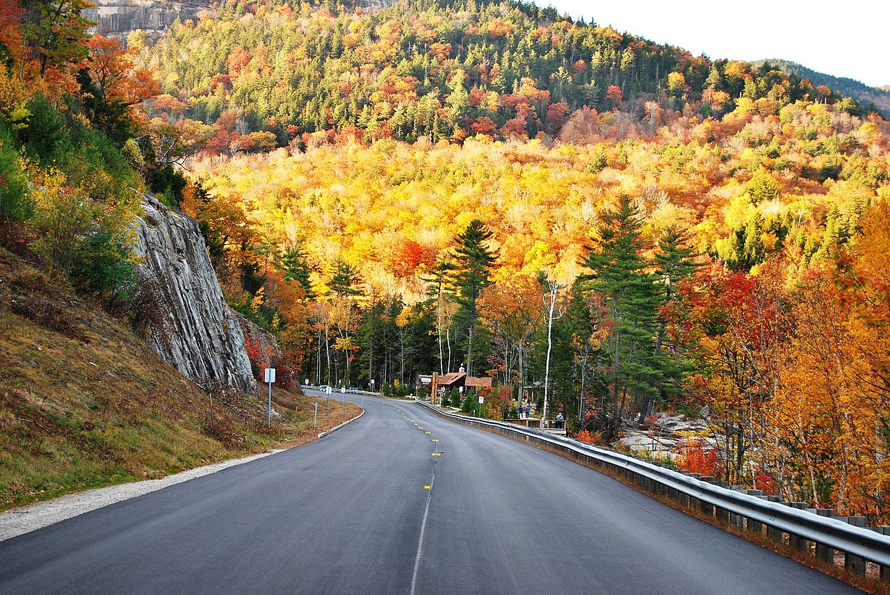 A view of the Kancamagus Highway in New Hampshire during fall season.