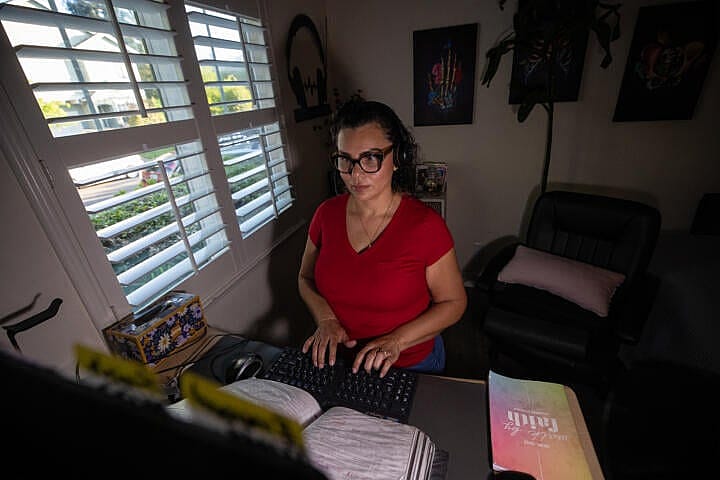 Kaiser Permanente advice nurse Raquel Alvarez Sanchez works from her home office in Santa Rosa on April 6, 2026.