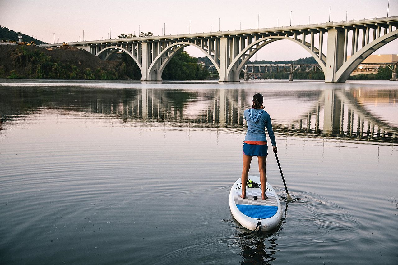 A woman paddling on the Tennessee River.