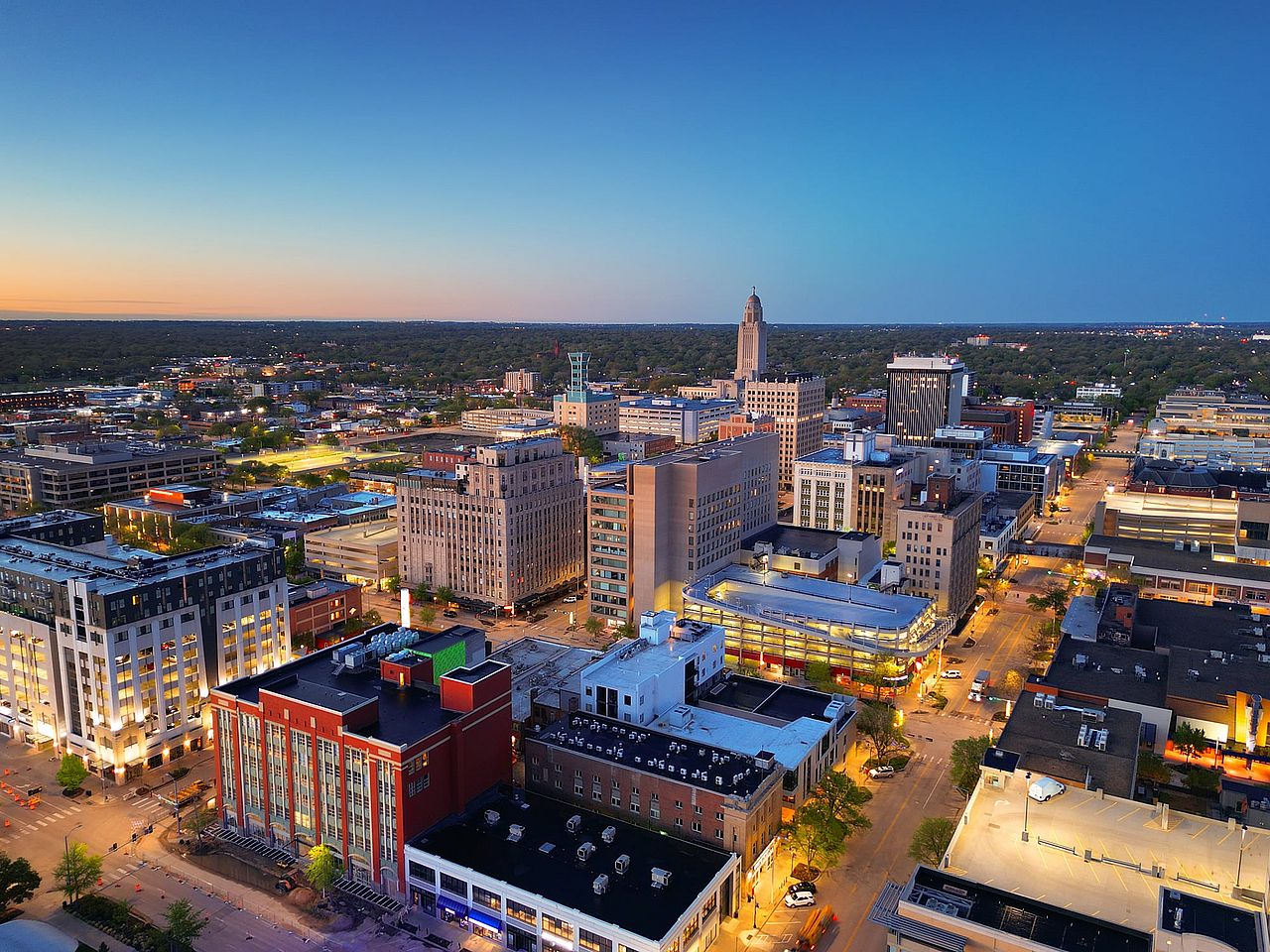 Aerial view of downtown city skyline of Lincoln at dawn.