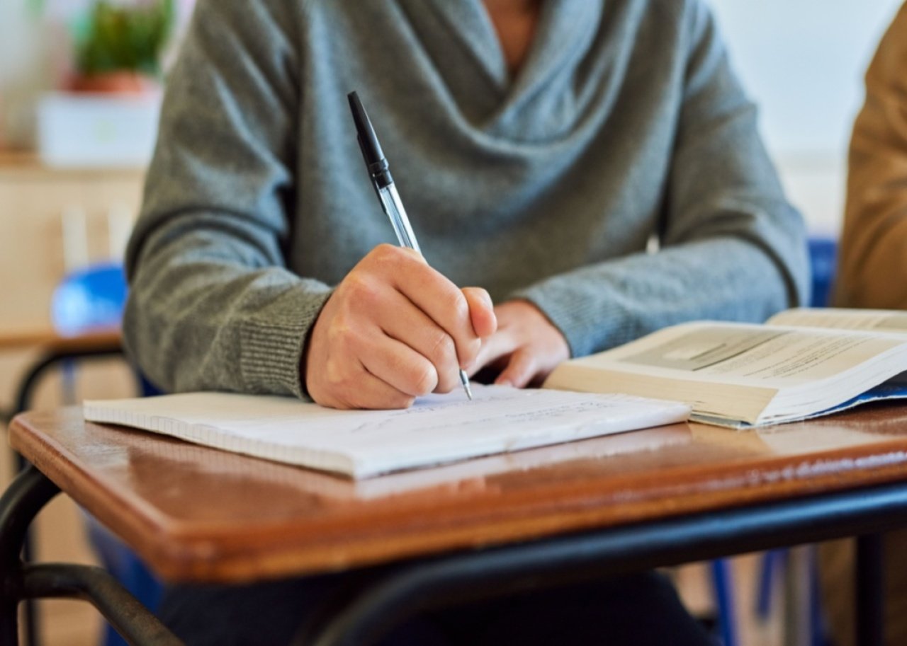 A student taking notes.