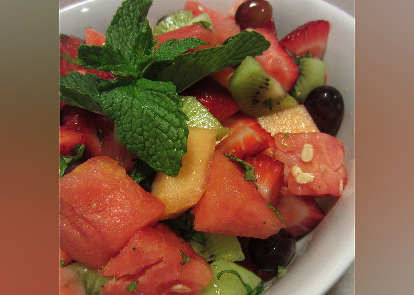 Summer Fruit Salad with a Lemon, Honey, and Mint Dressing