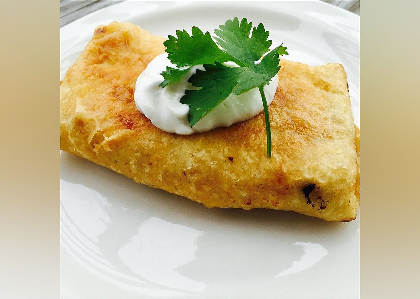 Chicken Chimichangas with Sour Cream Sauce