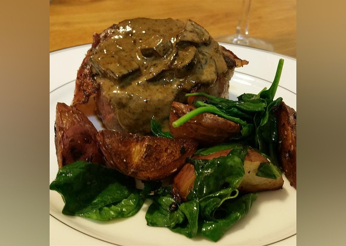 Crab-Stuffed Filet Mignon with Whiskey Peppercorn Sauce