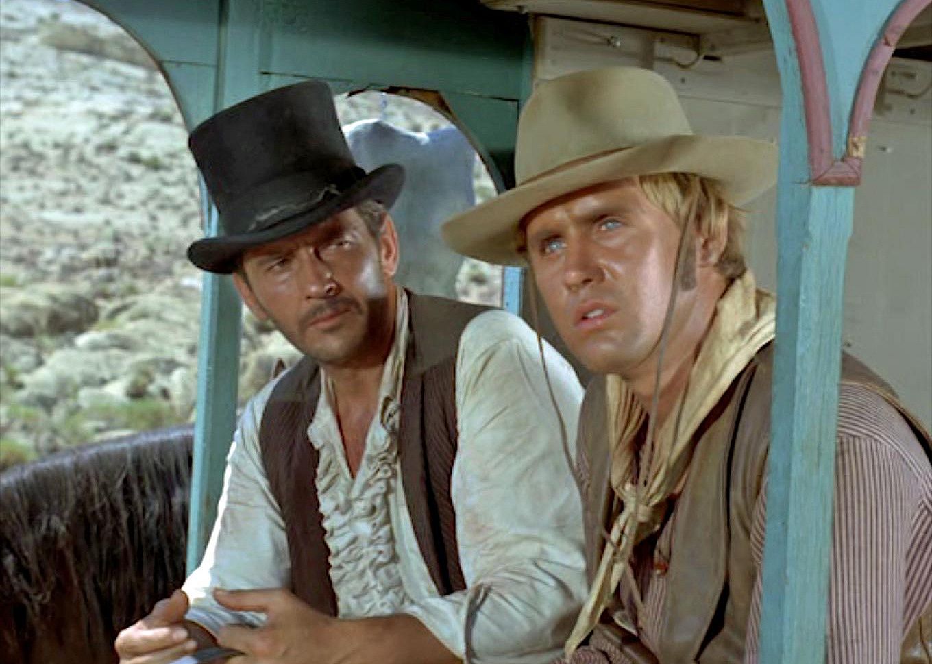 Two men in a carriage.