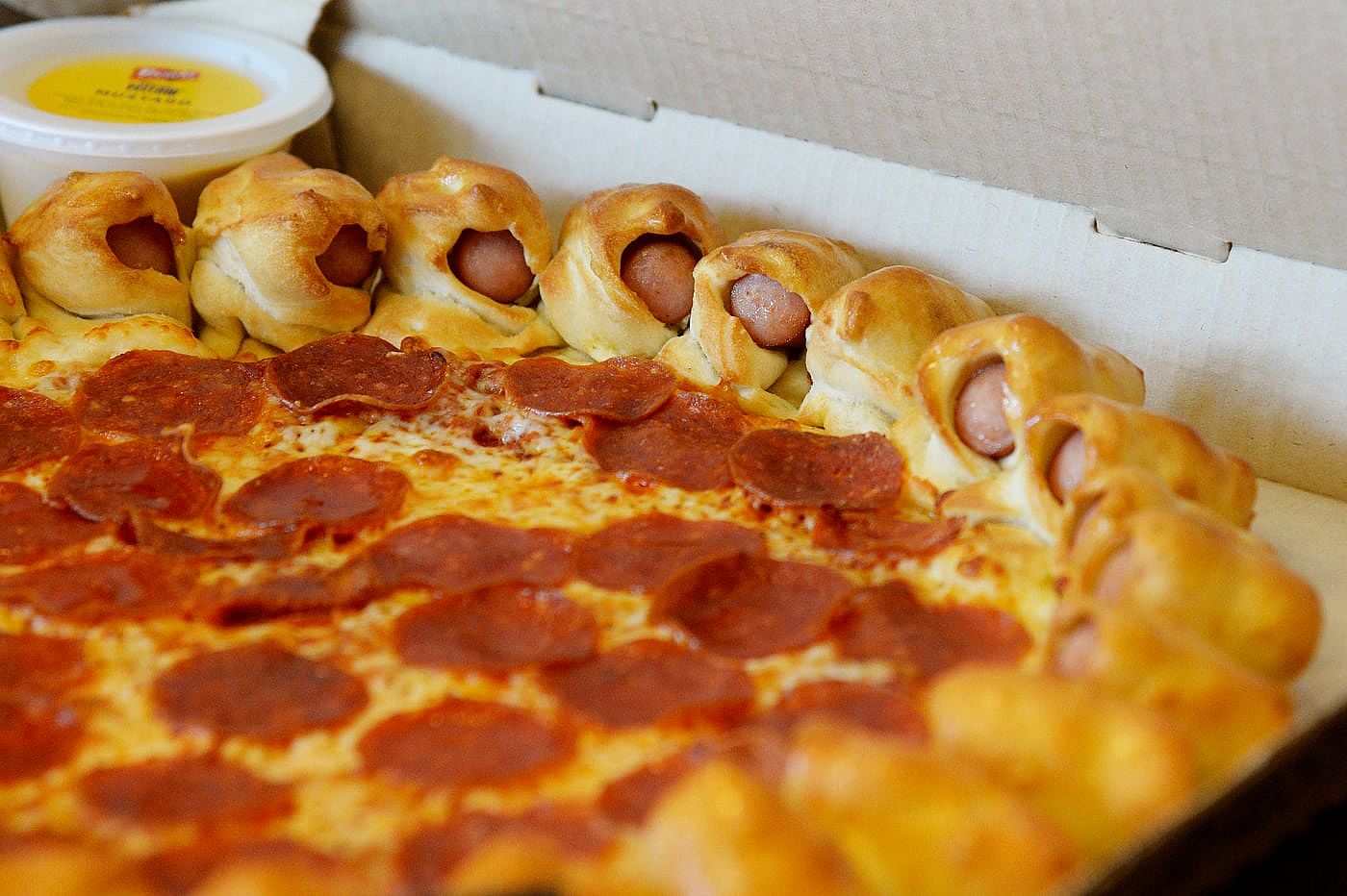 A close up shot of the Hot Dog Bites Pizza from Pizza Hut.