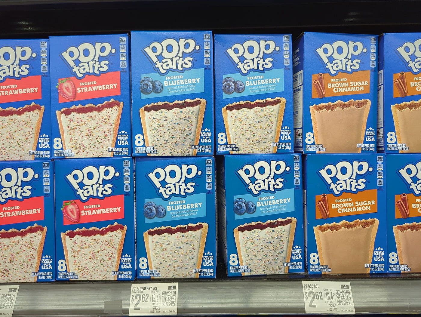 Photo of a grocery shelf with various flavors of Pop-Tarts.