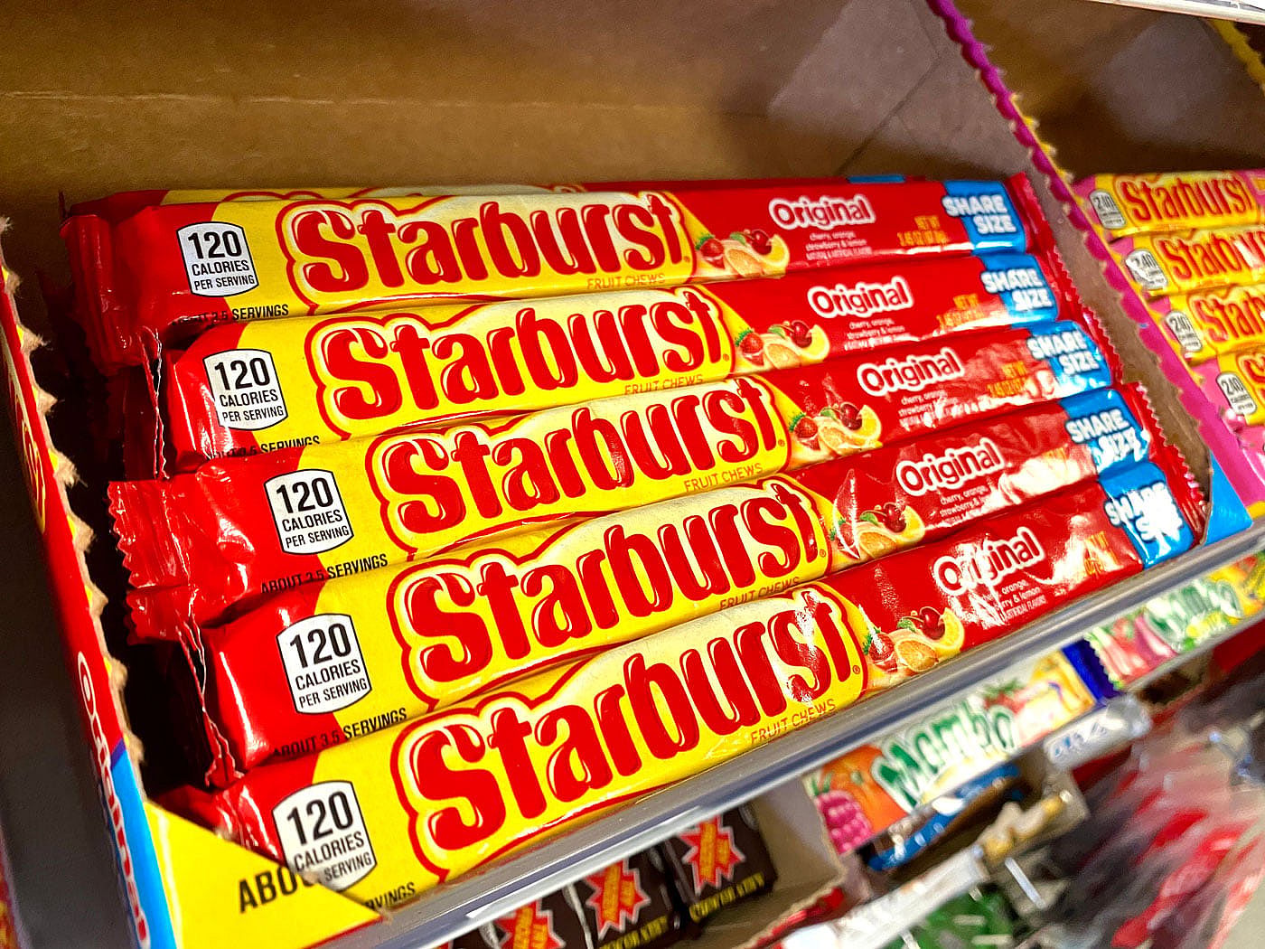 Starburst candies in a box at a grocery store