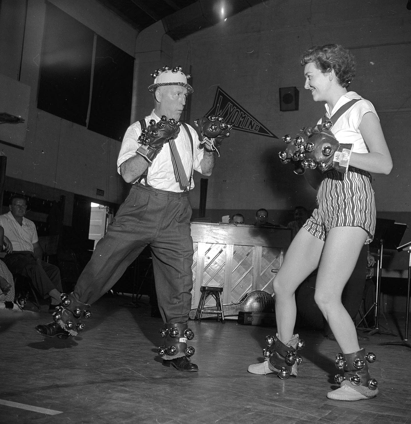 A husband and wife practice a humourous boxing routine for their slot in a showboat show circa 1955. 