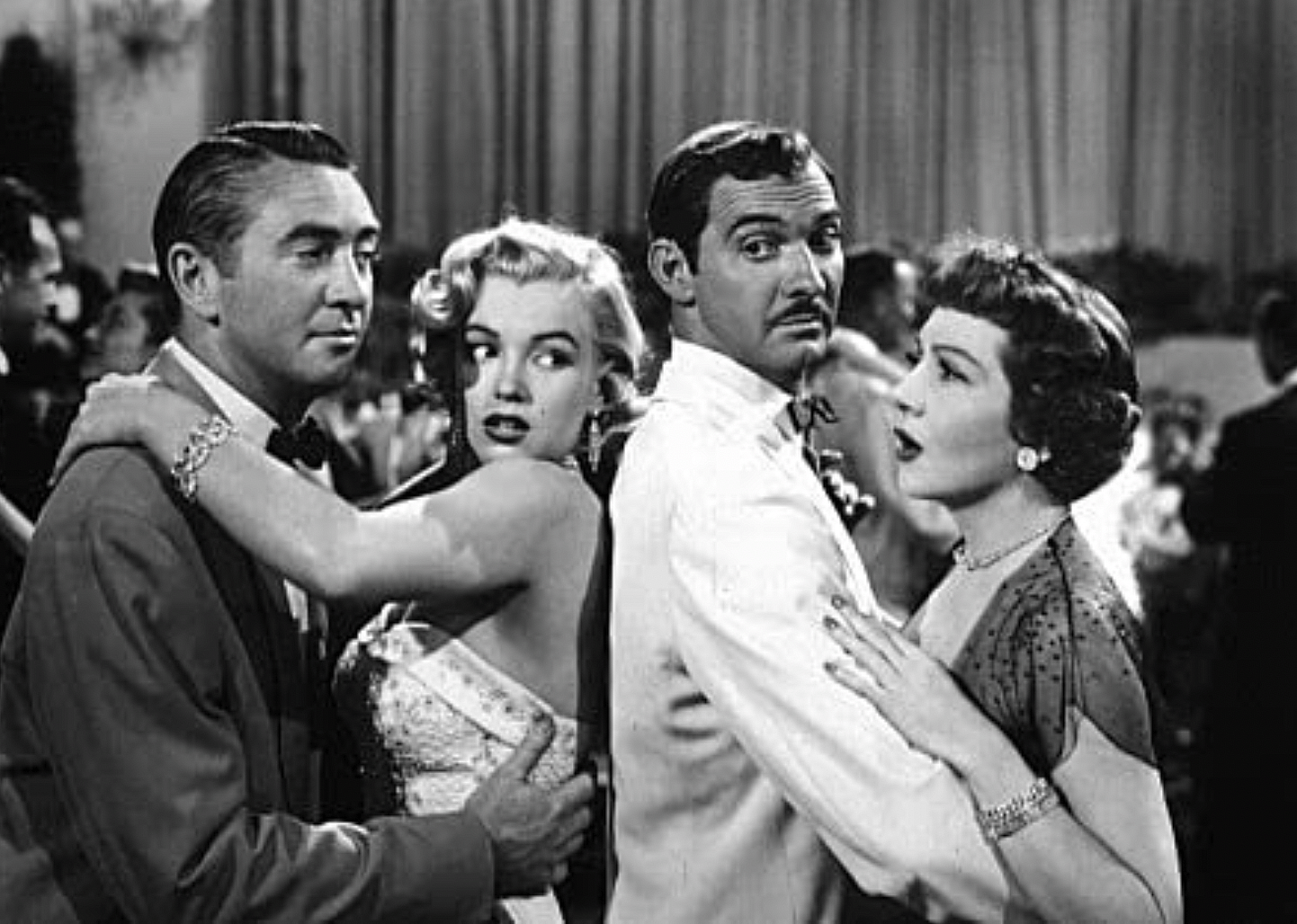 Marilyn Monroe, Claudette Colbert, Macdonald Carey, and Zachary Scott in "Let's Make It Legal"