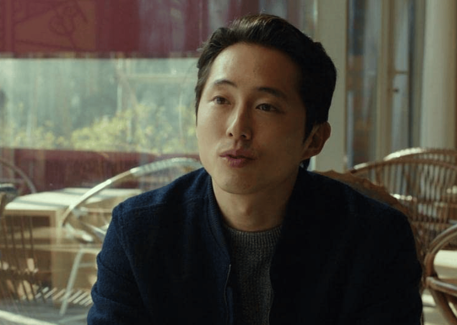 Steven Yeun in a scene from "Burning". 