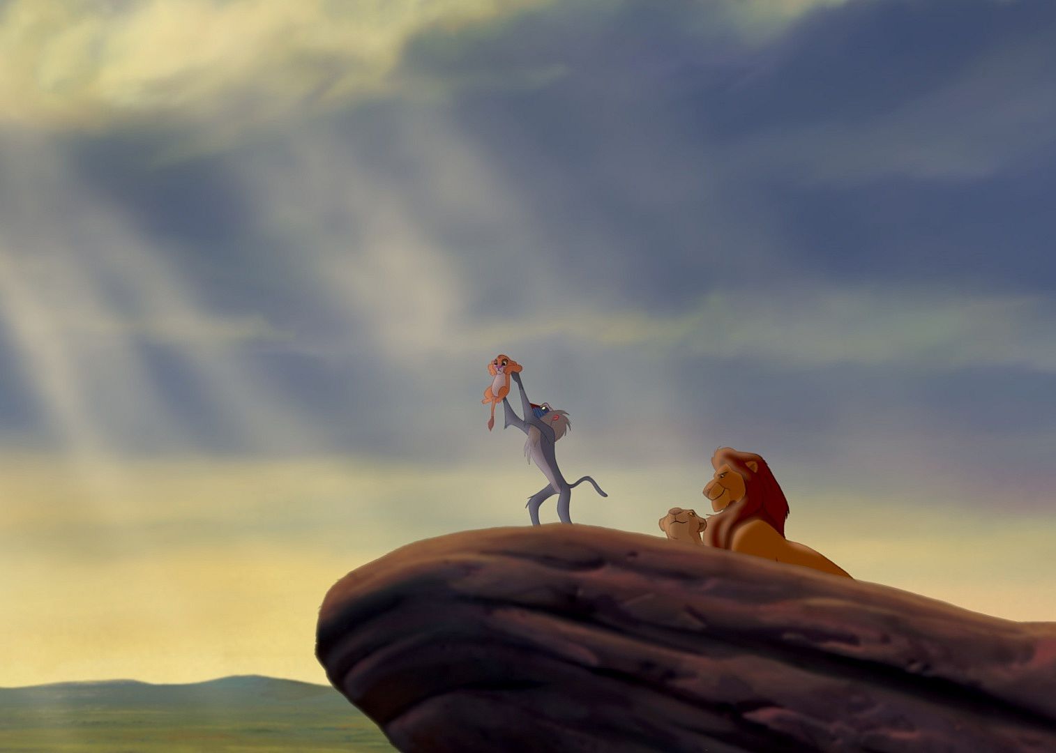 A cartoon of a monkey displaying a lion cub over a cliffside with the parents behind him smiling.