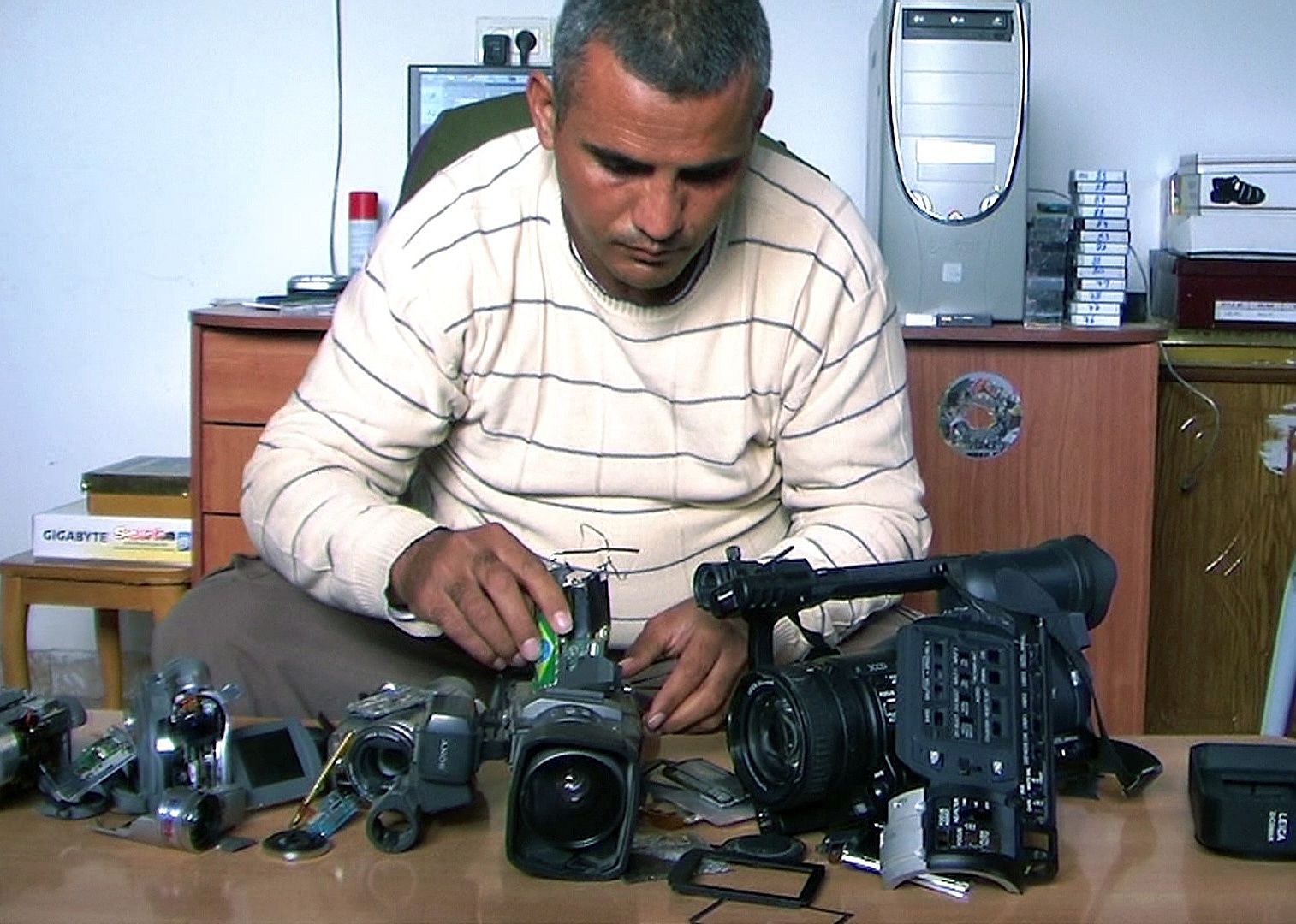 #24. 5 Broken Cameras (2011)