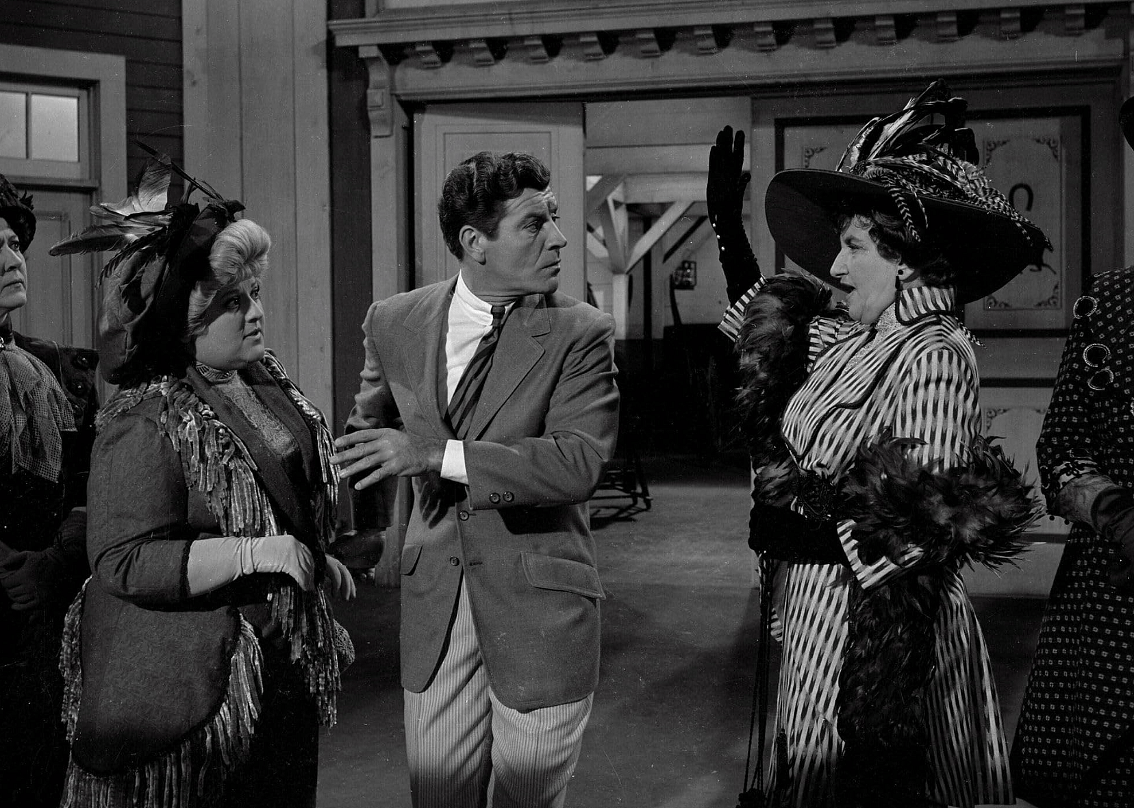 Hermione Gingold, Peggy Mondo, Robert Preston, and Sara Seegar in "The Music Man".