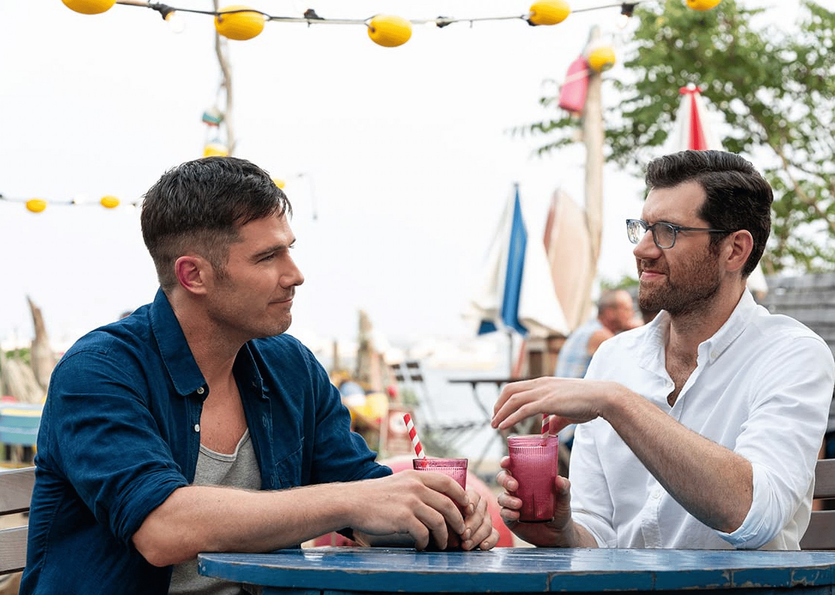 Luke Macfarlane and Billy Eichner in a scene from "Bros."