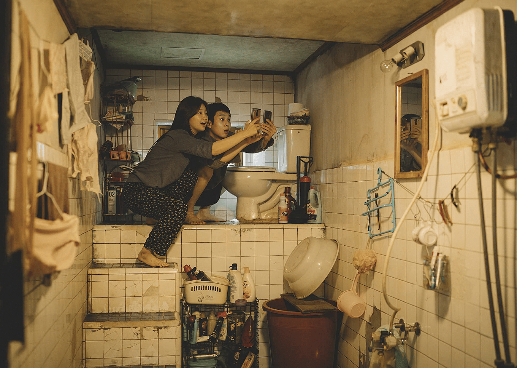 Choi Woo-sik and Park So-dam in "Parasite".