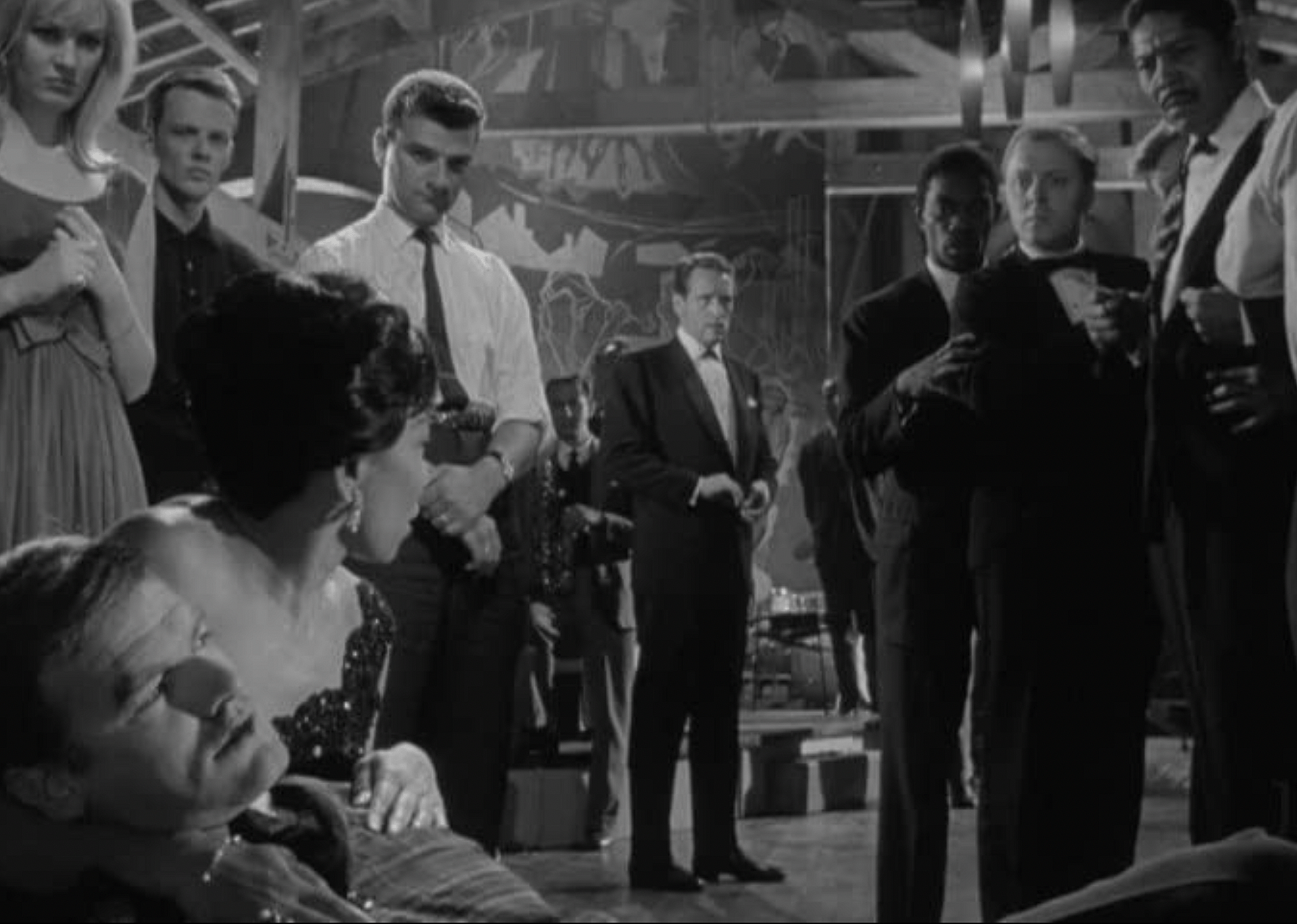 Richard Attenborough, Patrick McGoohan, Paul Harris, Keith Michell, María Velasco, and Allan Ganley in a scene from "All Night Long"