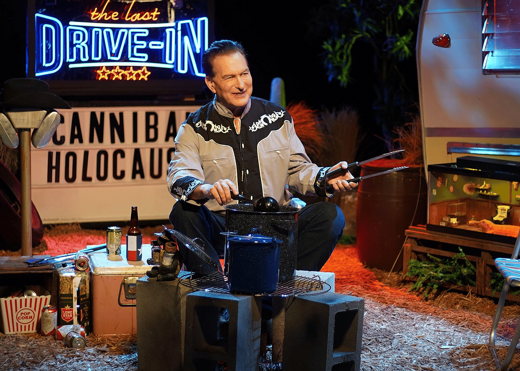 John Bloom in episode "Cannibal Holocaust" of series "The Last Drive-In with Joe Bob Briggs".