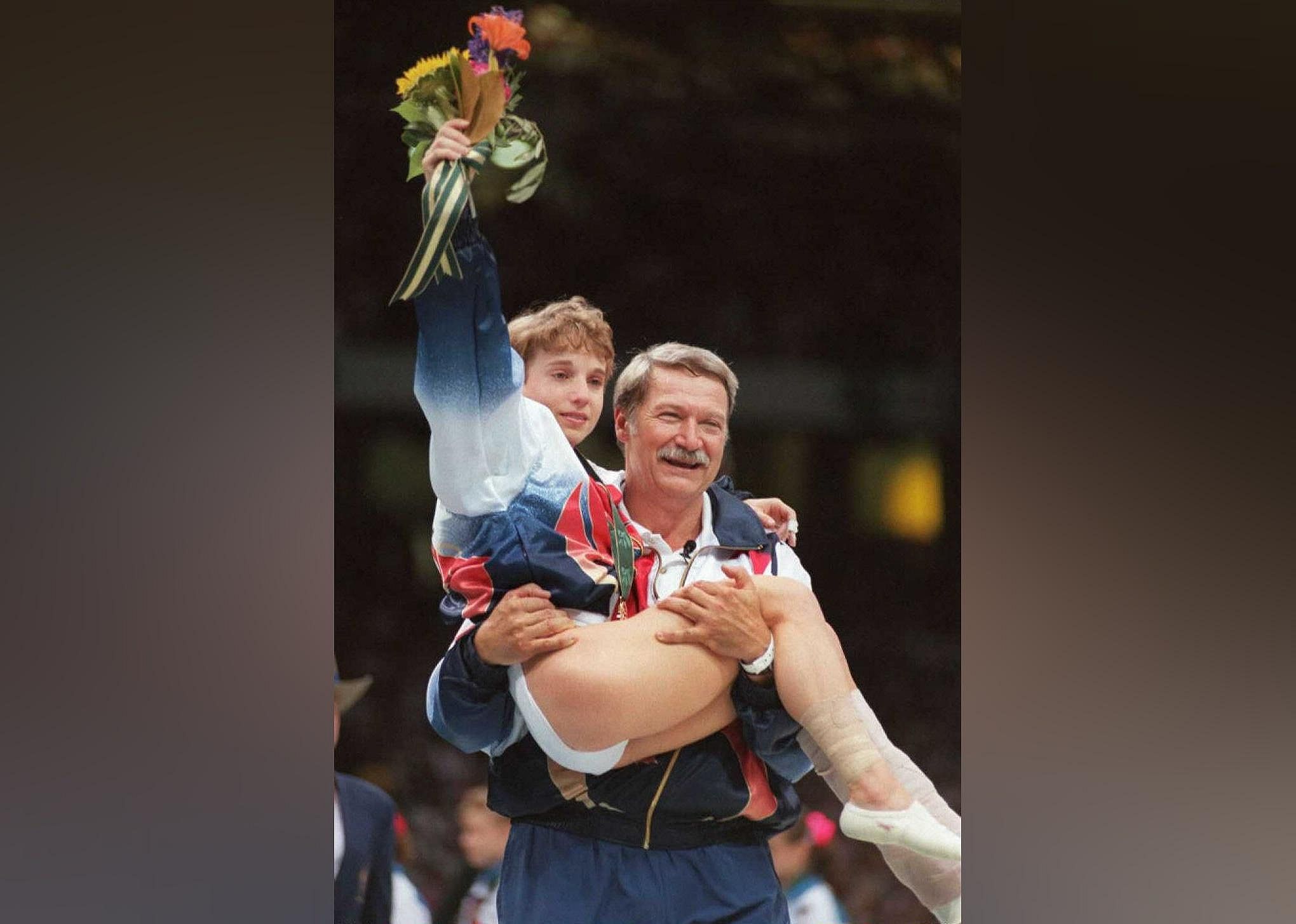 1996: Kerri Strug guts out vault despite injured ankle