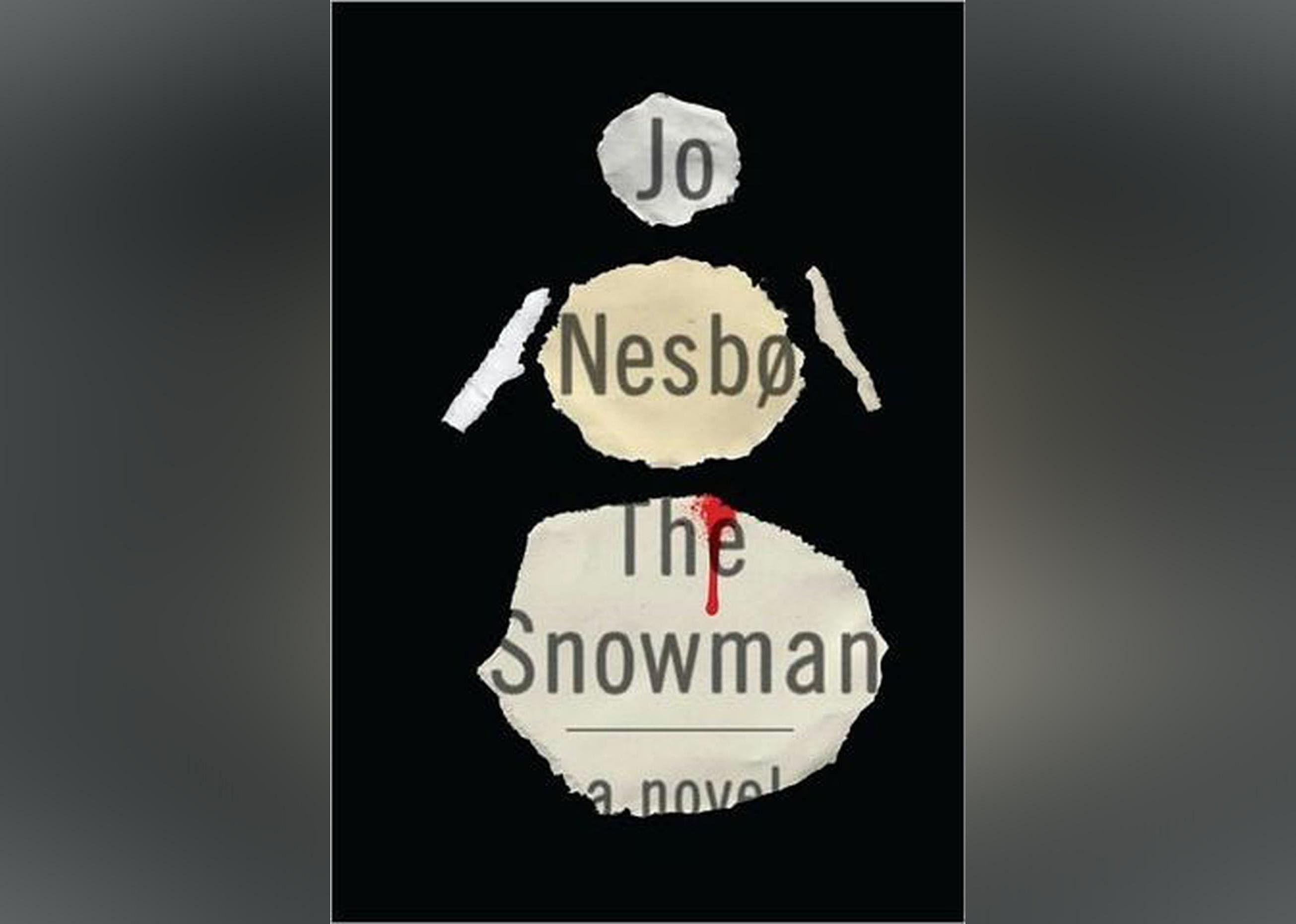 A mostly black cover that is stylized to look like someone has ripped a snowman-shaped figure from the paper, revealing the author's name, the novel's title, and a small smudge of blood. 