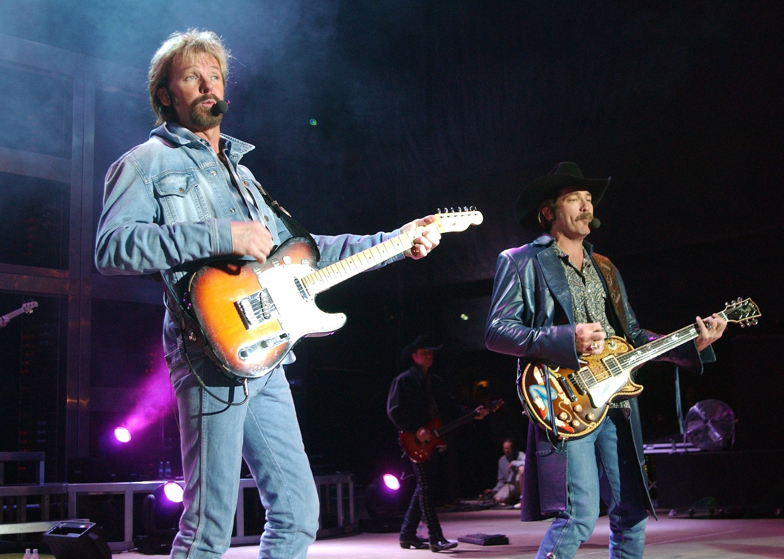 Kix Brooks and Ronnie Dunn of Brooks & Dunn perform during the "Neon Circus" tour.