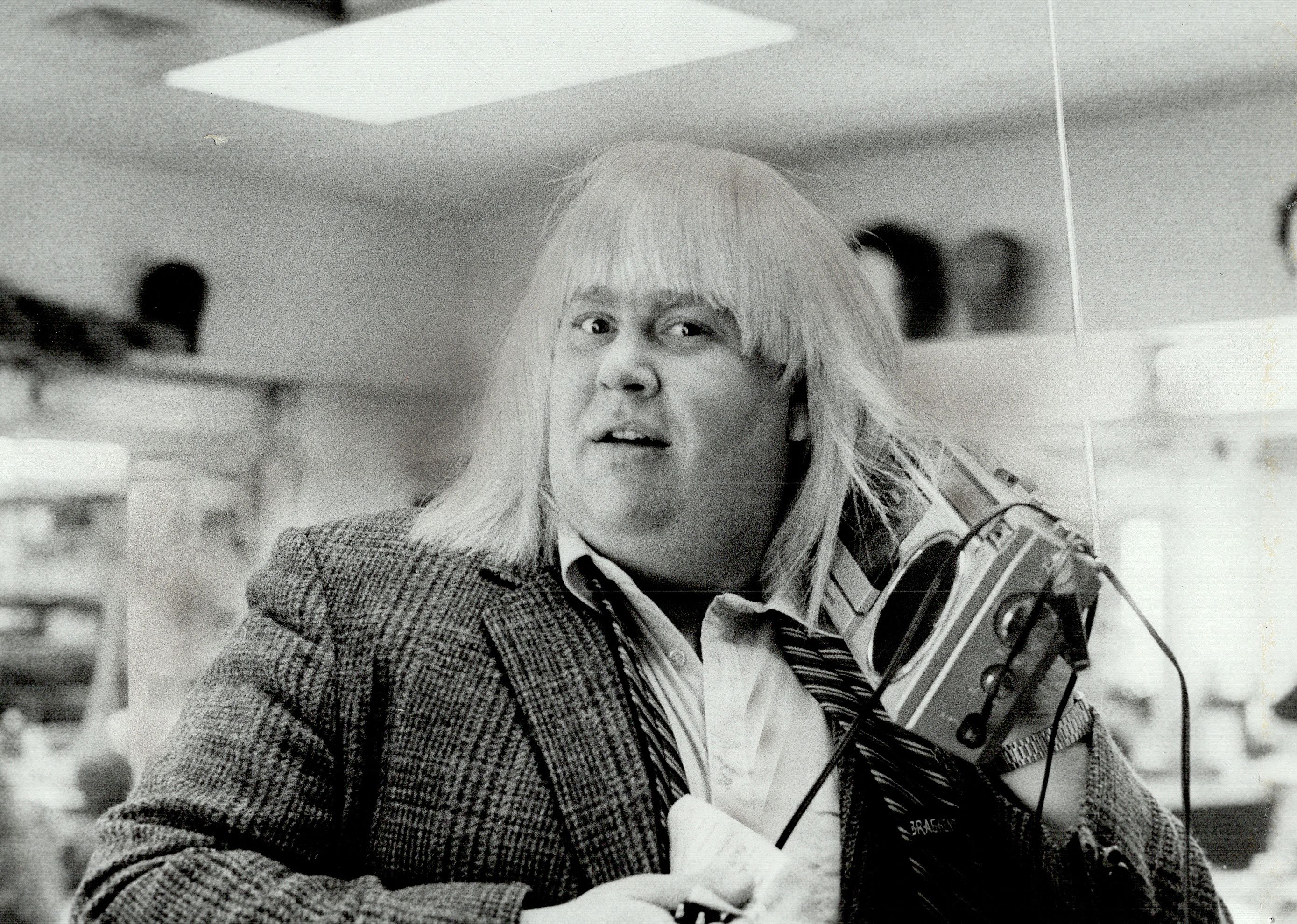 Answer #24: Who is John Candy?