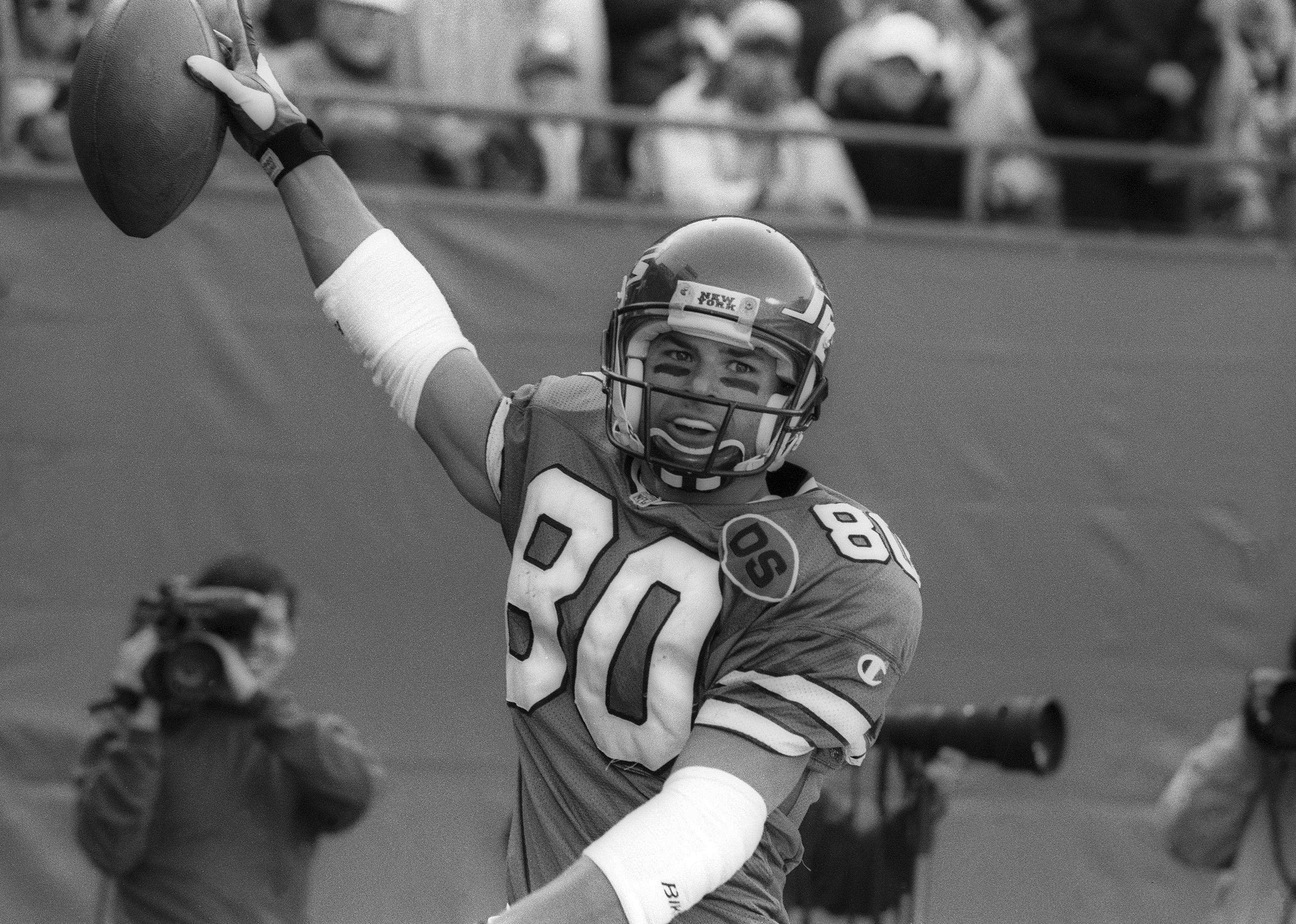 Wide receiver Wayne Chrebet of the New York Jets celebrates a touchdown.
